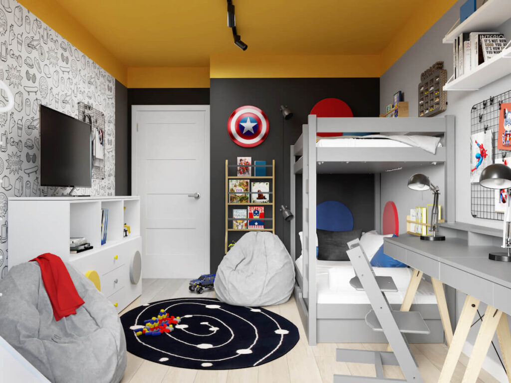 Szaro czarny pokój dla dwóch chłopców z żółtym sufitem a także szarym łóżkiem piętrowym białą komodą dwoma workami do siedzenia oraz tarczą Kapitana Ameryki na ścianie