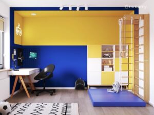 Biało niebiesko żółty pokój dla chłopca a w nim białe biurko na drewnianych nogach żółto biały regał i drewniana drabinka gimnastyczna z niebieskim materacem