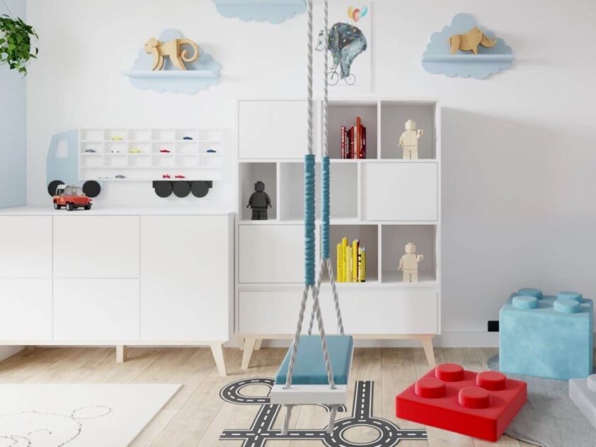 minimalistyczna pojemna komoda na drewnianych nogach w pokoju dziecka