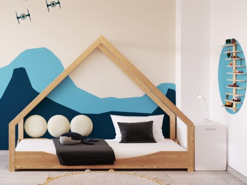 okrągłe panele tapicerowane przy łóżku dziecięcym