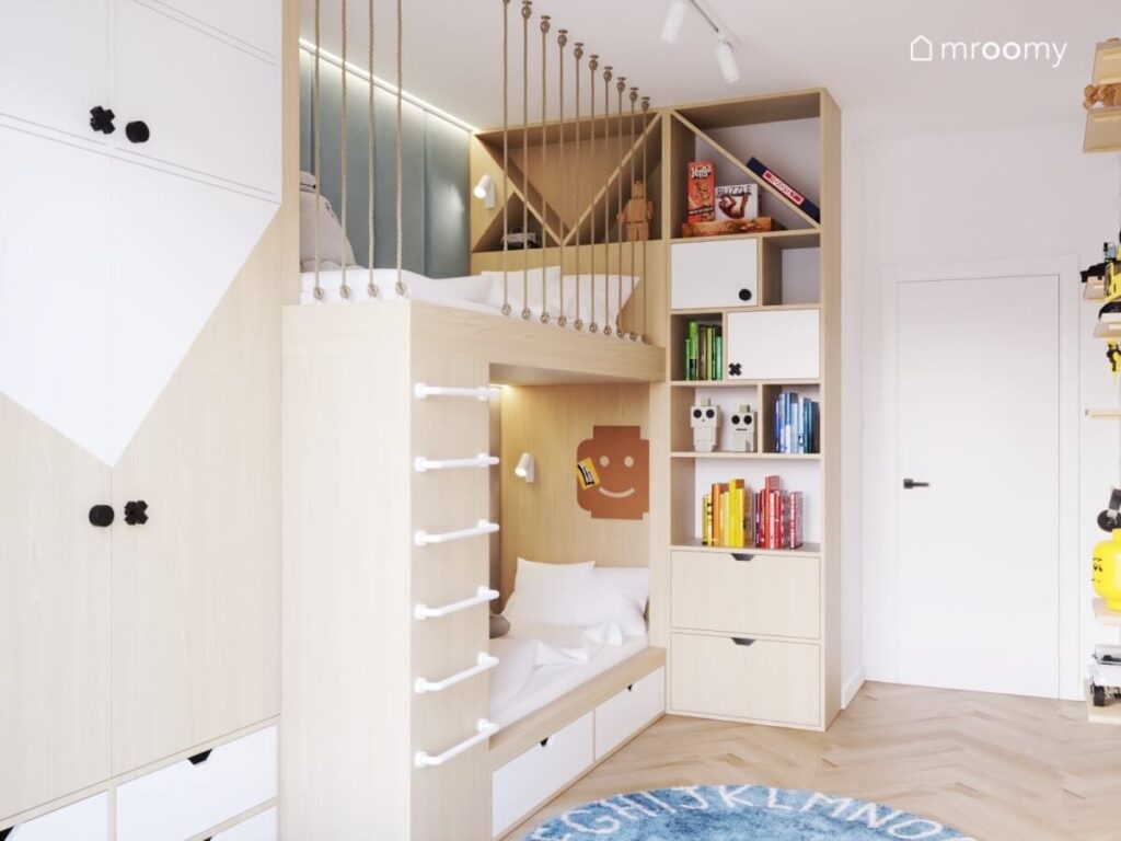 Jasny pokój dla chłopca i dziewczynki z biało drewnianymi meblami i niebieskim dywanem z alfabetem