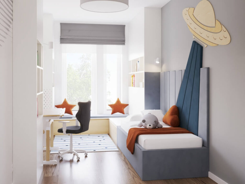 Biało szary pokój dla chłopca z białymi meblami niebieskim tapicerowanym łóżkiem oraz kosmicznymi motywem na ścianie